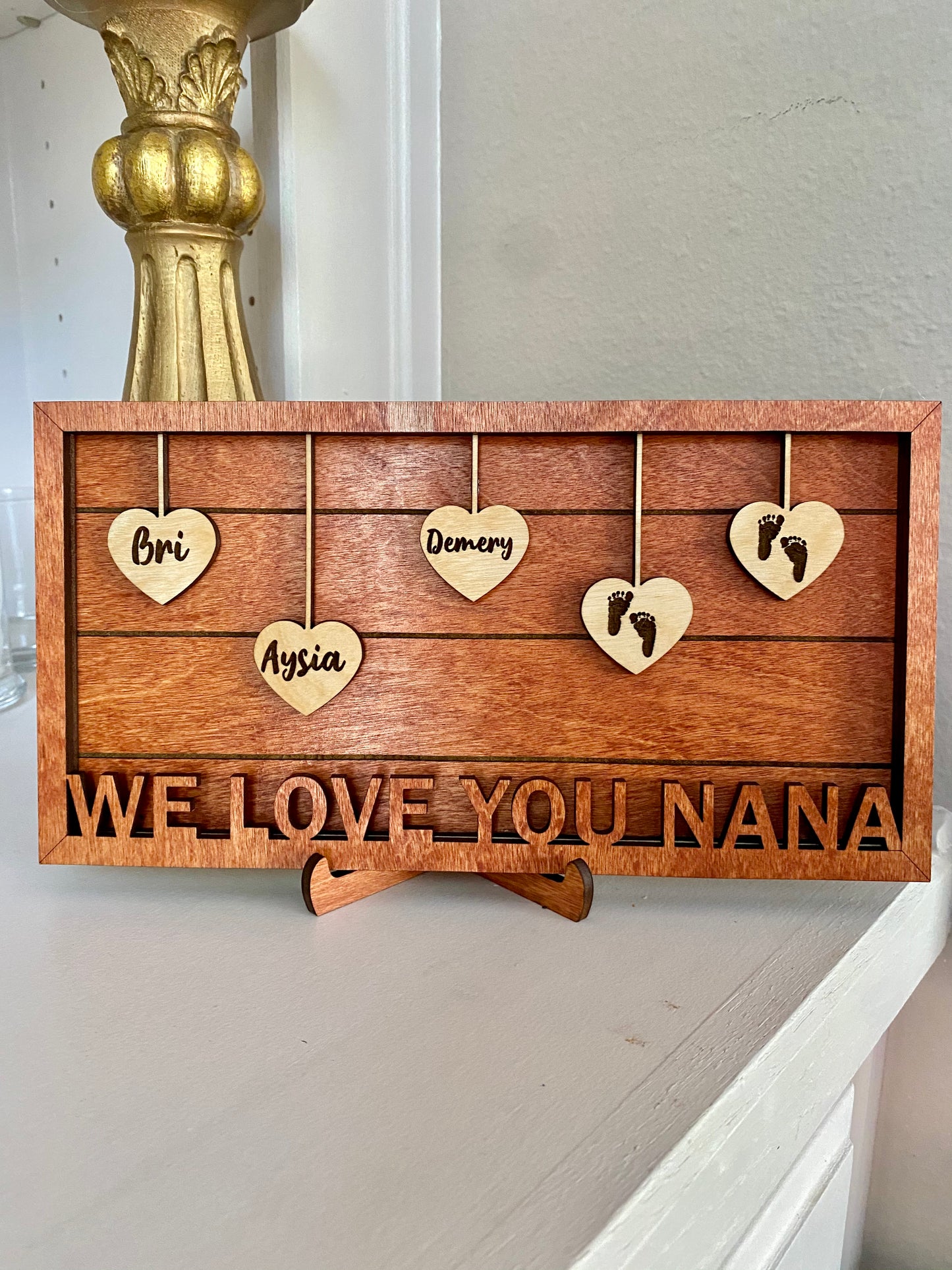 Dangling heart family sign