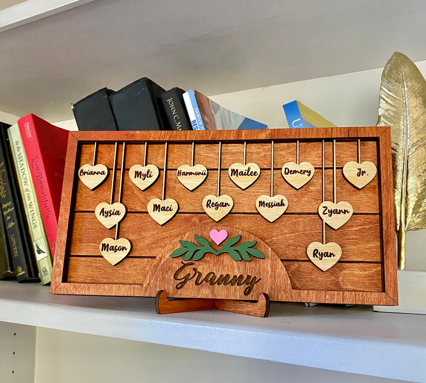 Dangling heart family sign