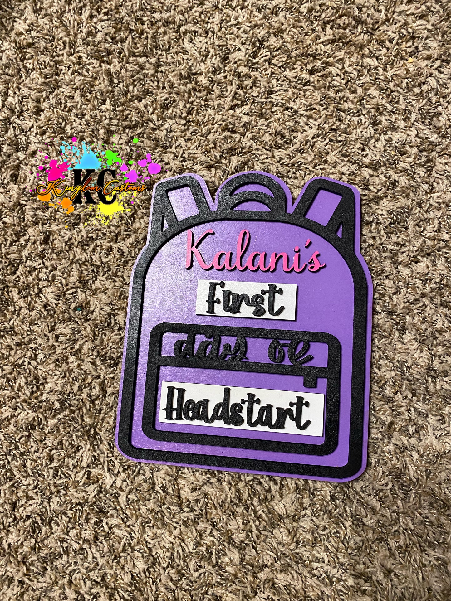 Backpack back to school sign